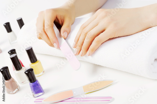 Woman using nailfile