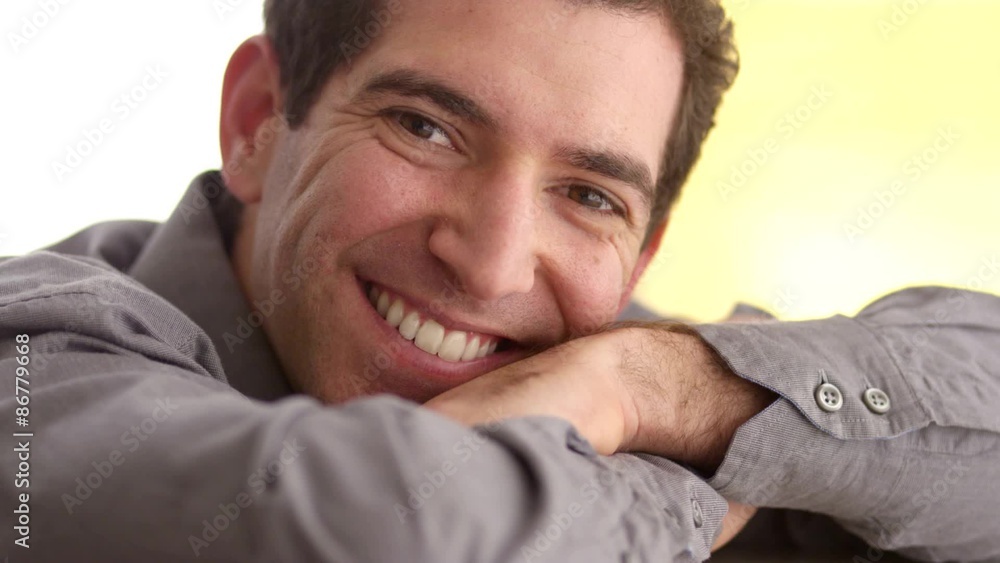 Happy businessman looking at camera Happy businessman looking at camera