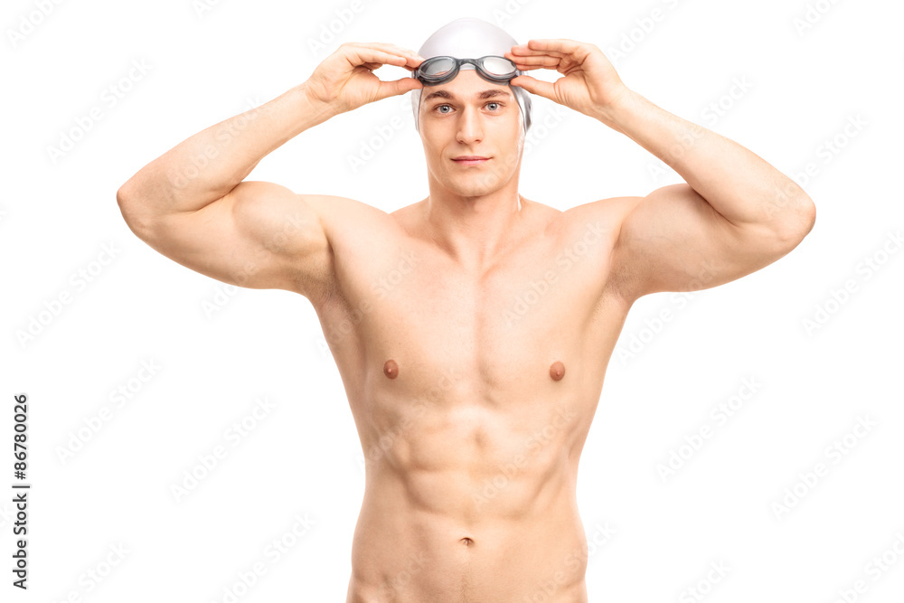 Muscular young swimmer with a gray swim cap Muscular young swimmer with a gray swim cap