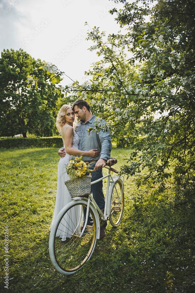 Loving couple with a bicycle 3125.