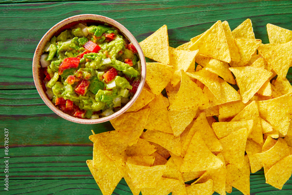 Guacamole with avocado tomatoes and nachos Guacamole with avocado tomatoes and nachos