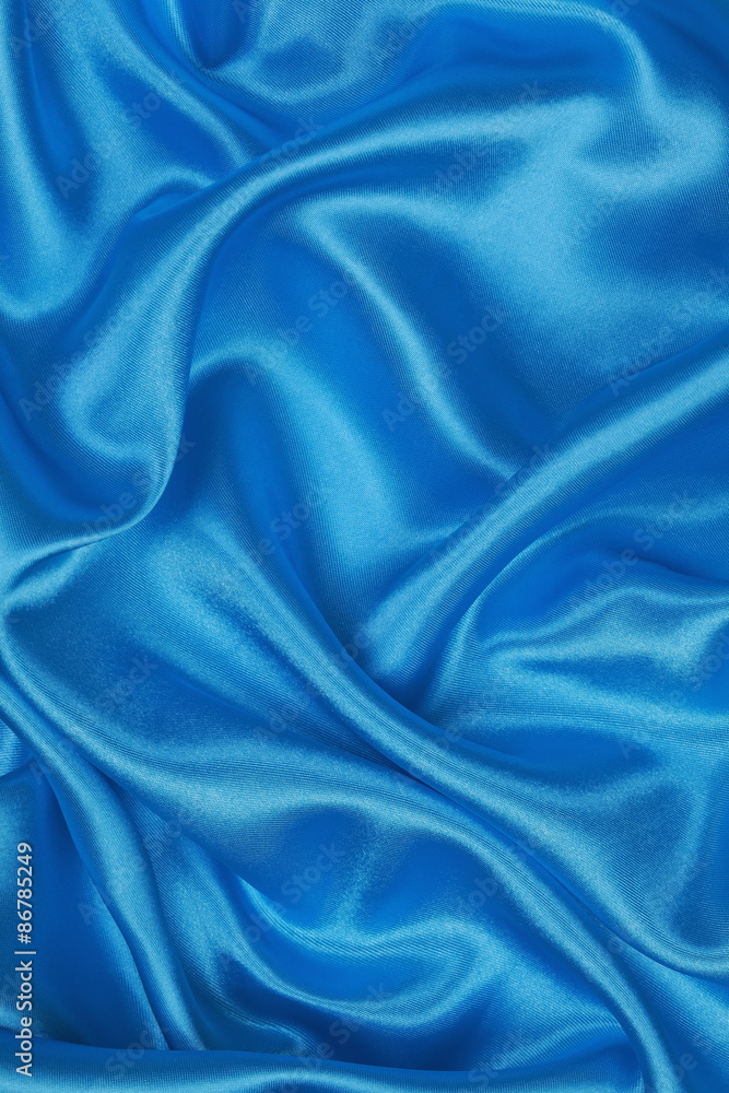 Fototapeta premium Blue Silk cloth of wavy abstract background