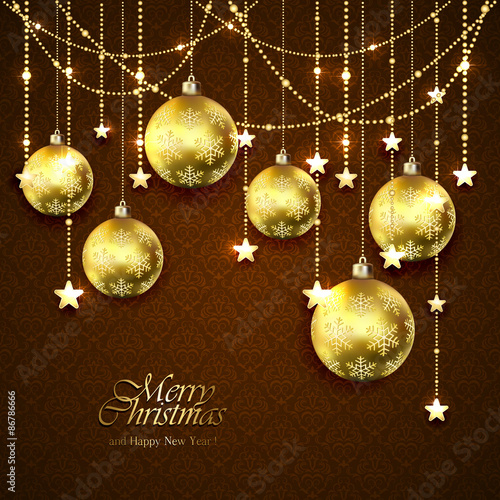 Golden Christmas balls and stars on brown background