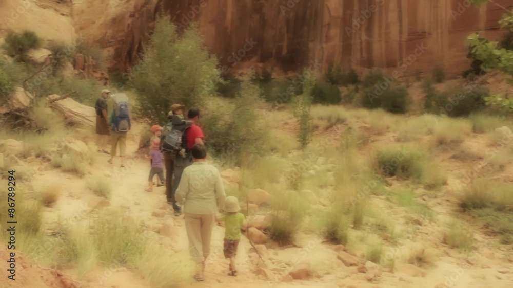 family hiking through capitol reef family hiking through capitol reef