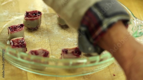 a woman making tasty berry pie pastries photo