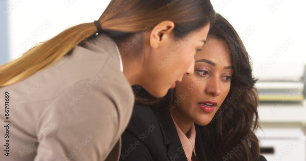 Mixed race business colleagues having a discussion Mixed race business colleagues having a discussion
