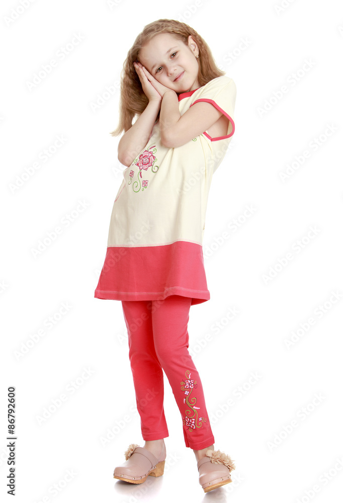 Beautiful blonde girl in a red pantsuit Beautiful blonde girl in a red pantsuit