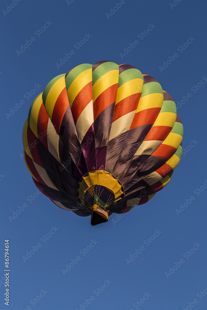 Fototapeta premium Colorful Hotair Balloon with blue sky in background