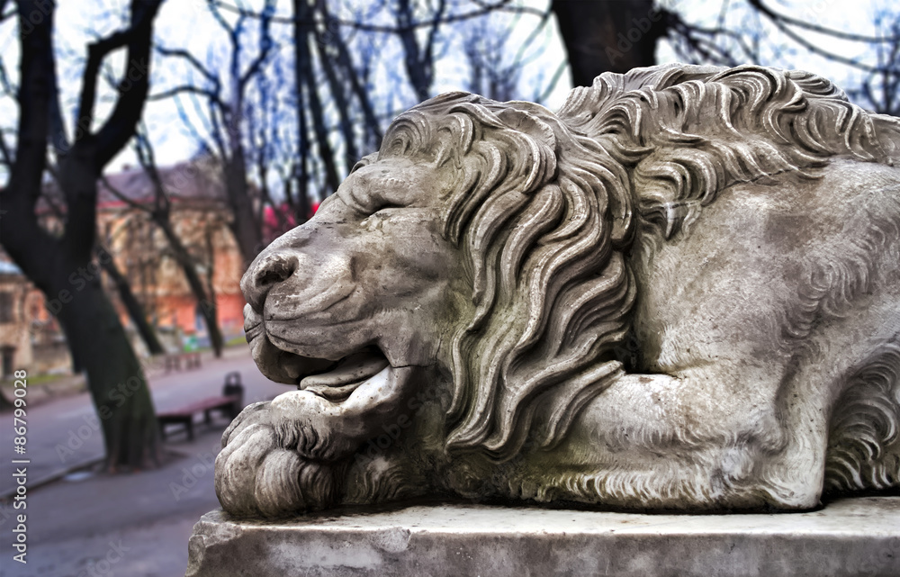 Powerfull sculpture of stone lion in Lviv Powerfull sculpture of stone lion in Lviv