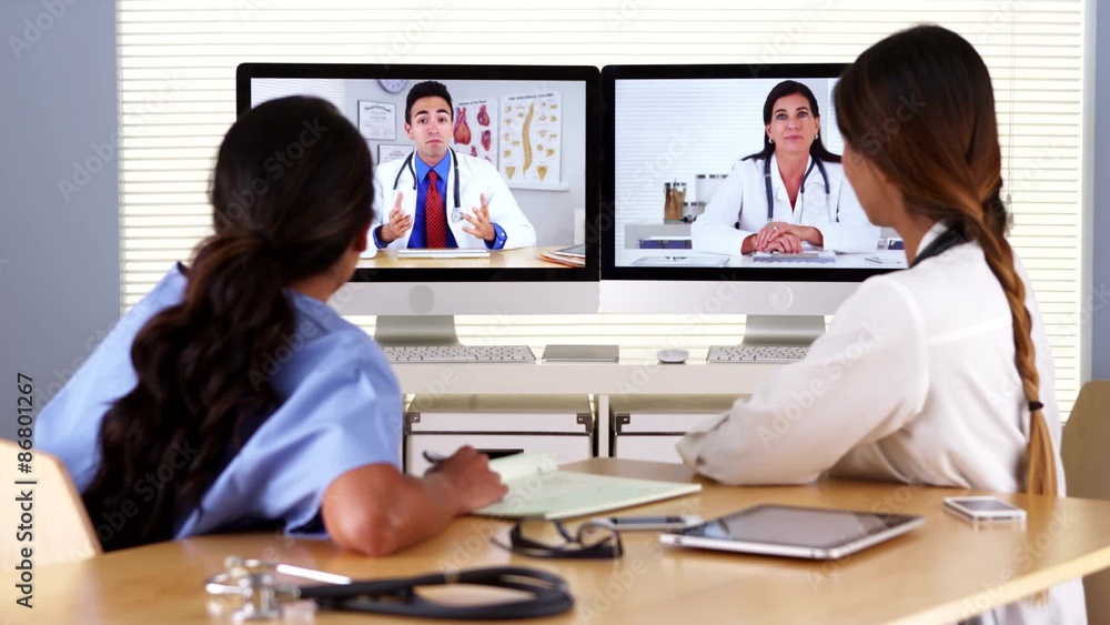 Team of diverse medical doctors having a video conference Team of diverse medical doctors having a video conference