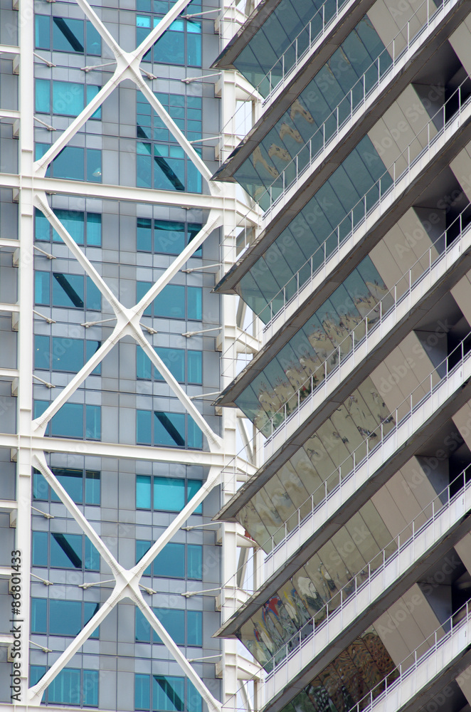 Skyscraper facade - modern architecture detail, Barcelona, Spain. Skyscraper facade - modern architecture detail, Barcelona, Spain.