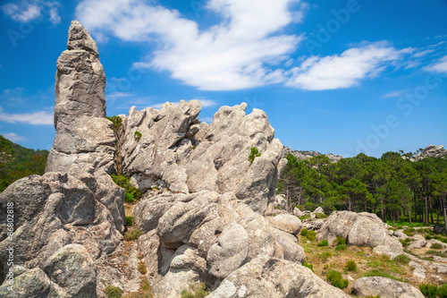 Corsica island, rocky mountains and dramatic sky © evannovostro