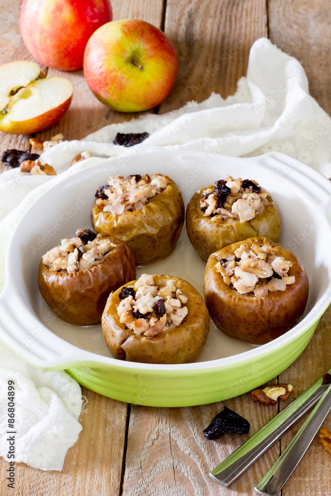 Delicious baked apple filled with minced meat, prunes, onions and walnuts
