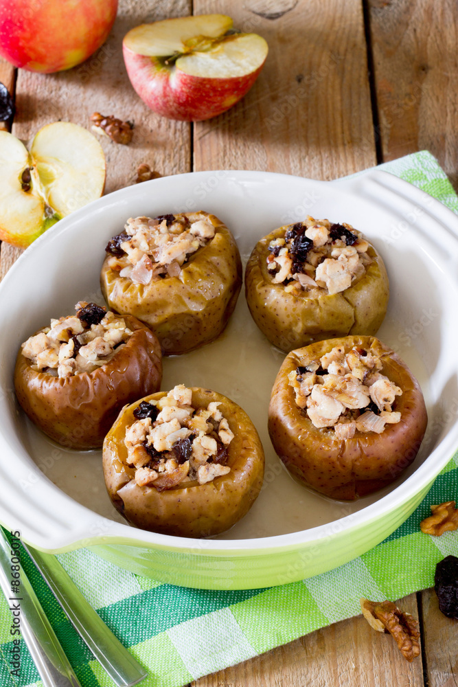 Delicious baked apple filled with minced meat, prunes, onions and walnuts