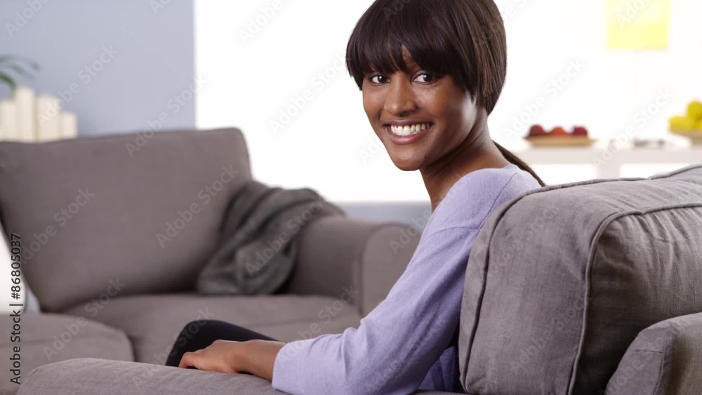 Cute black woman with bangs looking at camera Cute black woman with bangs looking at camera