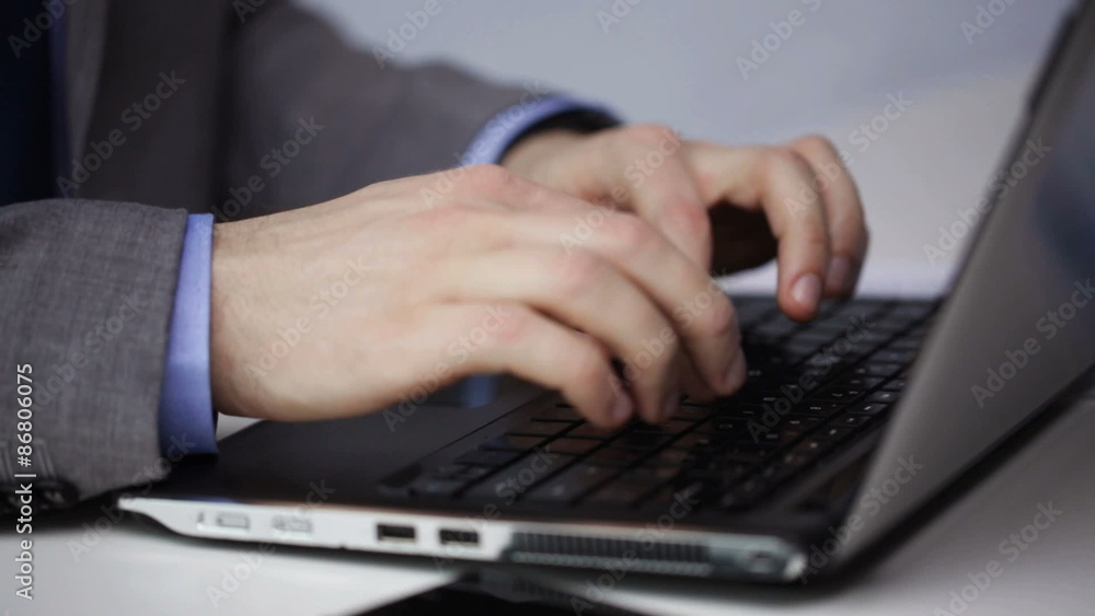 close up of businessman hands typing on laptop close up of businessman hands typing on laptop