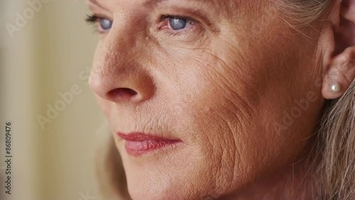 Elderly woman looking away closeup