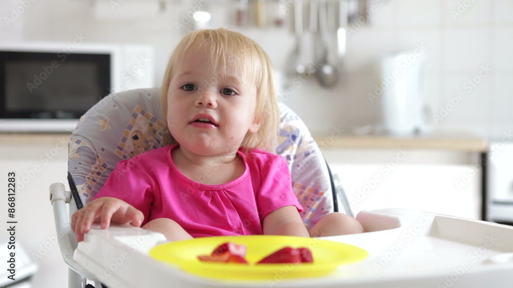 Time Lapse Clip Of Girl Sitting In High Chair Eating Strawberry Time Lapse Clip Of Girl Sitting In High Chair Eating Strawberry