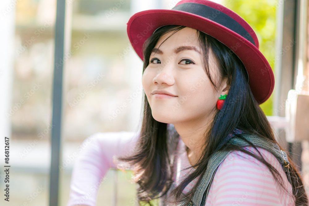 Young asian woman with red hat at outdoor Young asian woman with red hat at outdoor