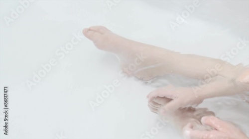 Toddlers feet in a bath tub
