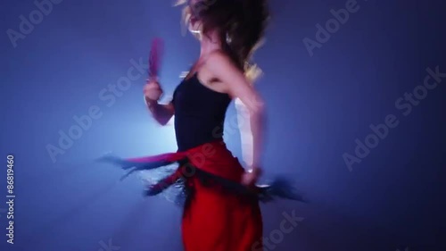 Young woman dancing flamenco