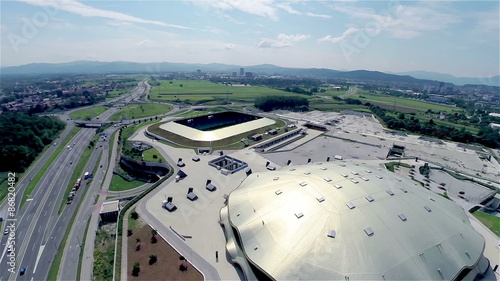 Wide aerial shot of Stozice soccer stadium and inside basketball ground photo