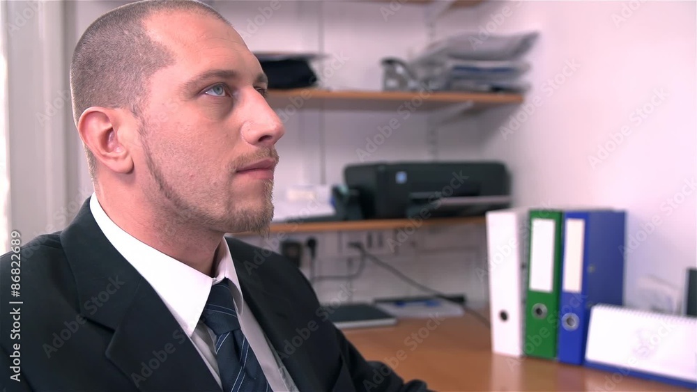 Businessman Looking At The Clock and Unhappy to See Customer Businessman Looking At The Clock and Unhappy to See Customer