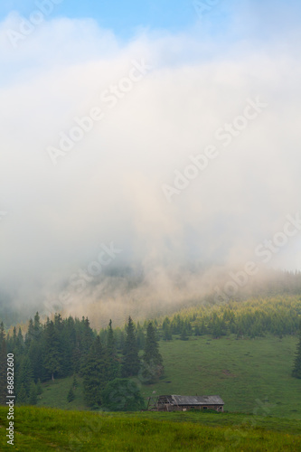 Amazing mountain landscape with fog