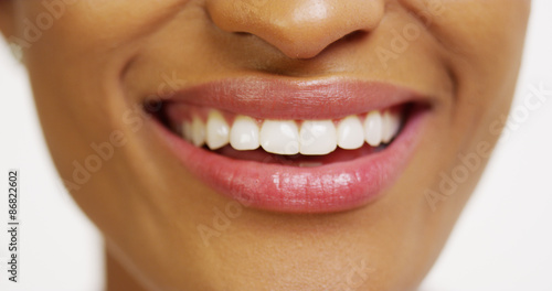 Close up of African woman with white teeth smiling