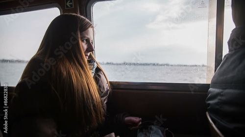 Woman enjoy ride on boat photo