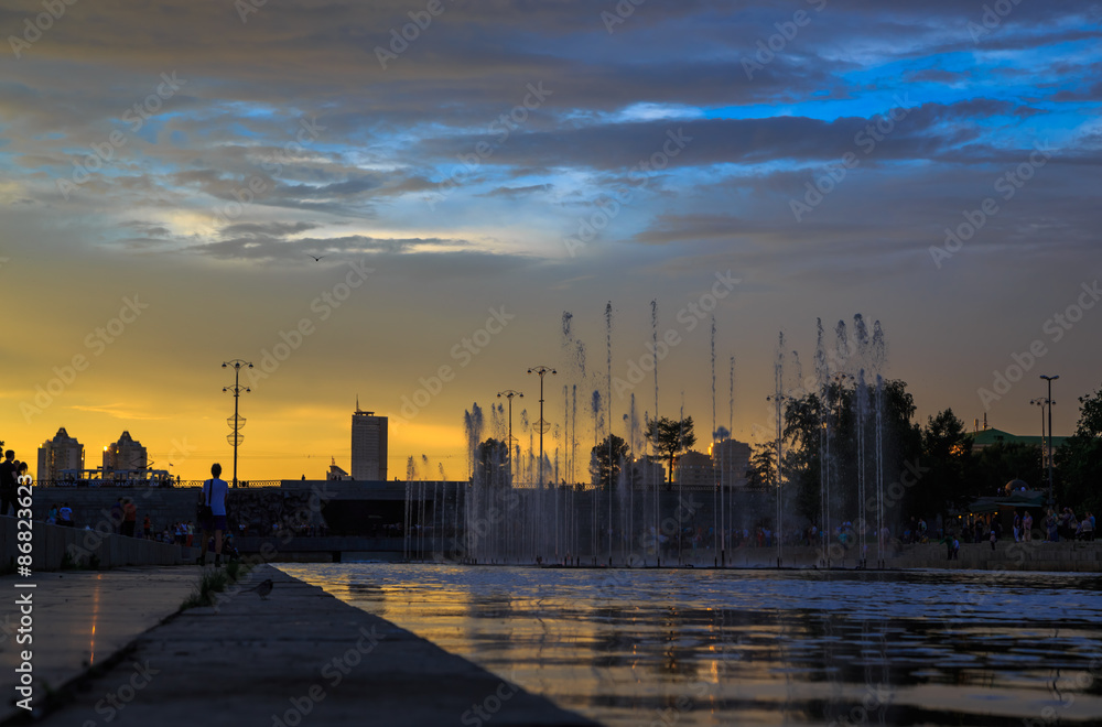 sunset over the river in the old town