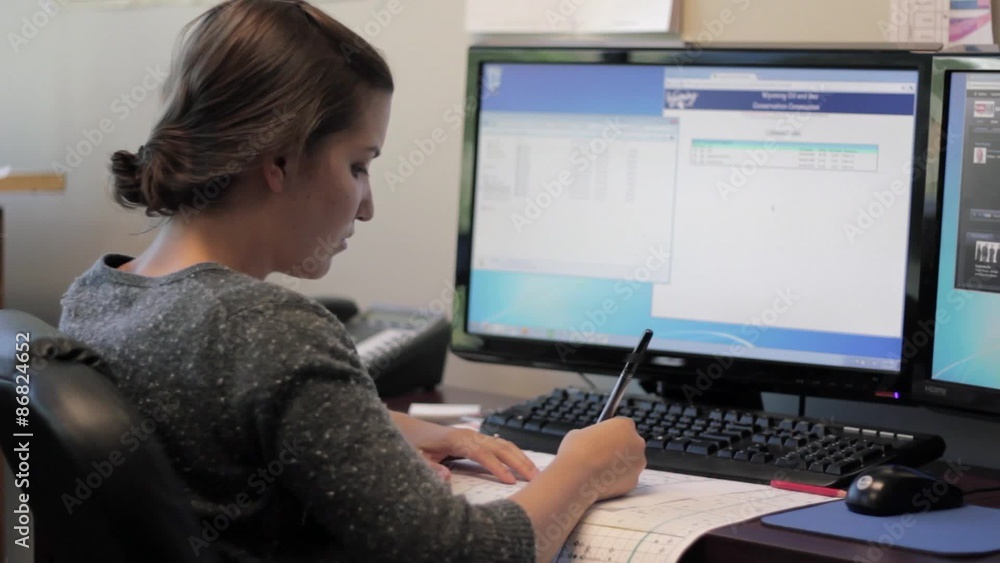 Woman working in officespace on computer