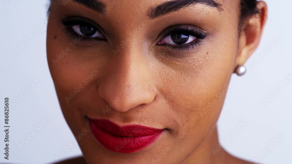 Attractive african woman looking at camera Attractive african woman looking at camera