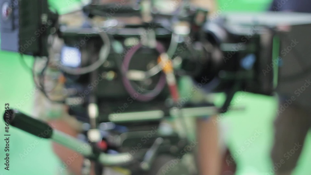 professional red camera on dolly tracks professional red camera on dolly tracks