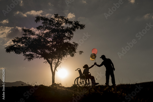 engelli çocuk ve kardeş sevgisi photo