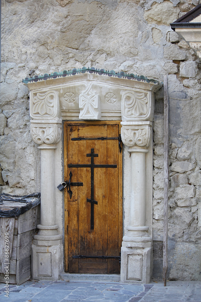 Vintage wooden door. Assumption Monastery of the Caves, Crimea