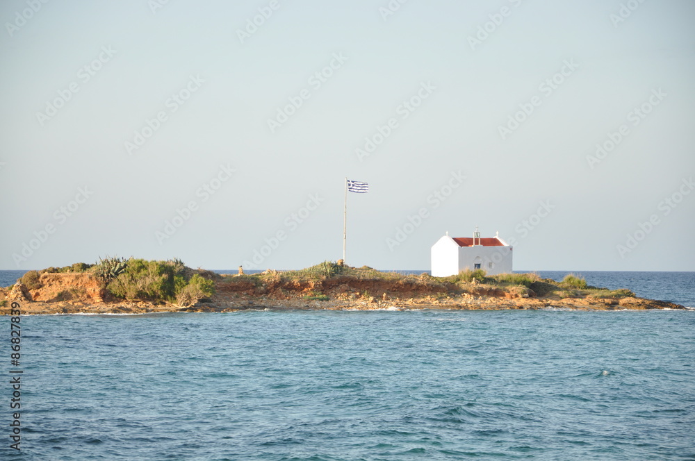 Small Greek island with a white church