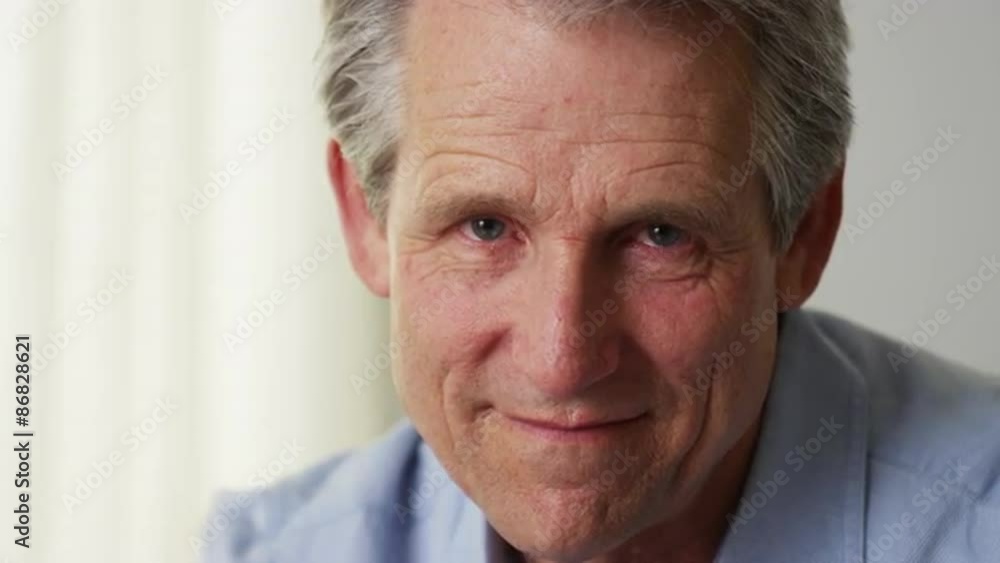 Closeup of mature man looking at camera Closeup of mature man looking at camera