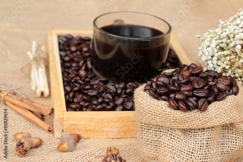 Roasted coffee beans with hot coffee