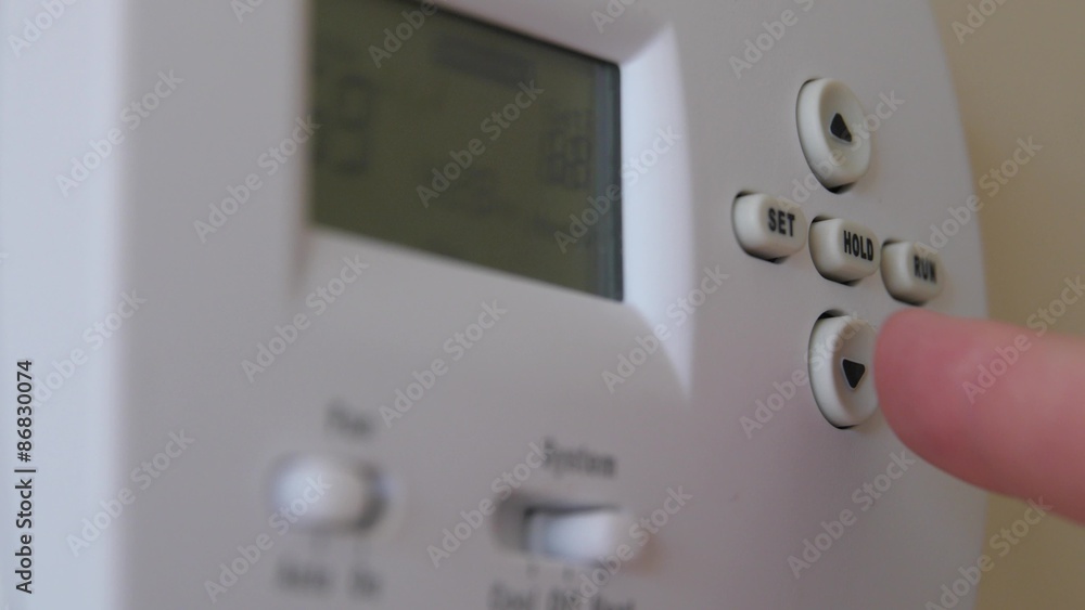 Turning down the temperature on a thermostat Turning down the temperature on a thermostat