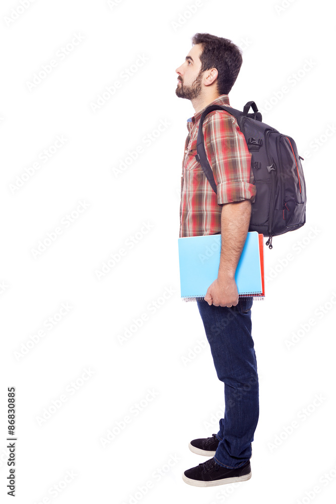 Full length of a pensive student, isolated on white background Full length of a pensive student, isolated on white background