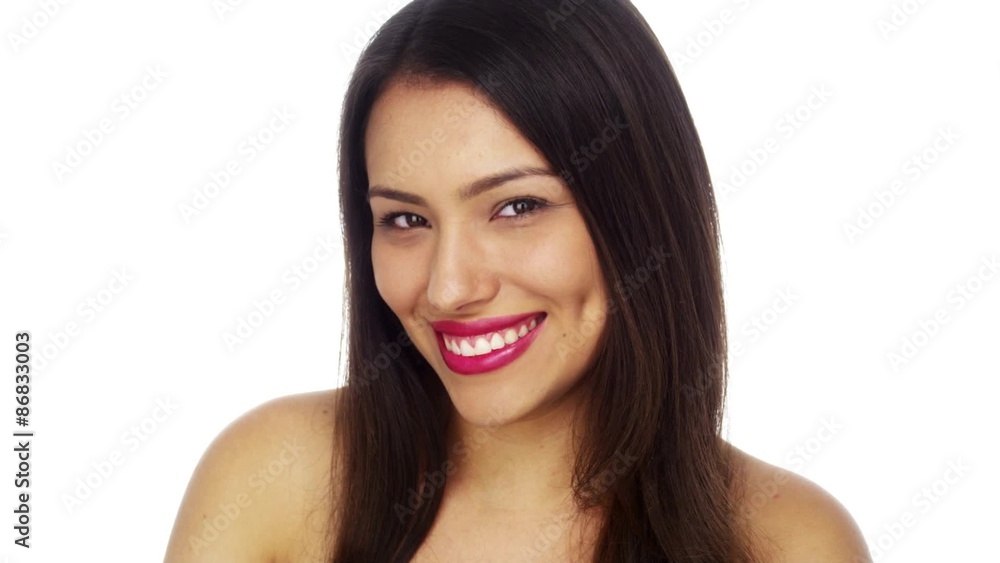 Mexican woman smiling and looking at camera Mexican woman smiling and looking at camera