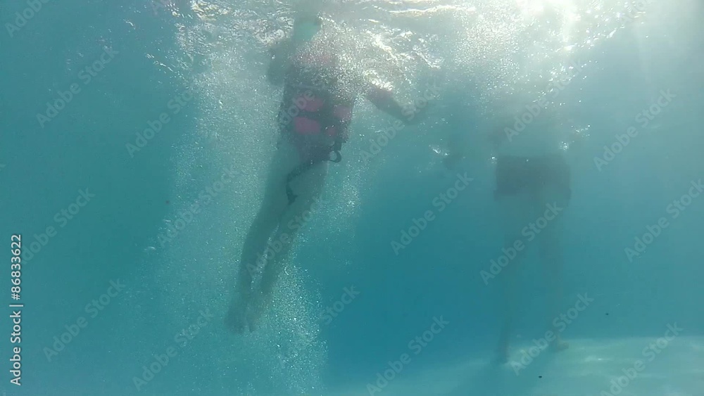 girl jumps in pool with life jacket girl jumps in pool with life jacket