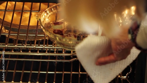 woman baking tasty berry pie pastries photo