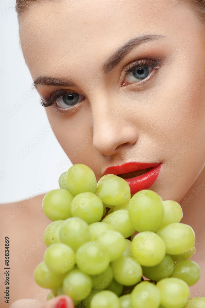 Attractive young woman with juicy sweet food Attractive young woman with juicy sweet food