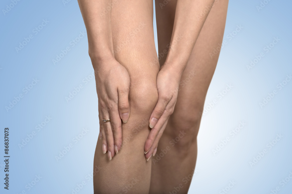 cropped image woman hands touching painful leg knee cropped image woman hands touching painful leg knee