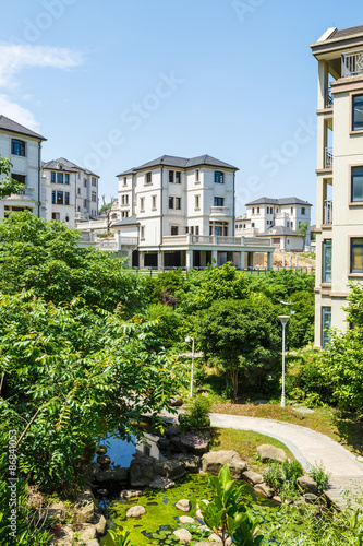 apartment building in suburban area © ABCDstock