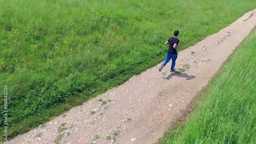 Aerial of Running on gravel track Aerial of Running on gravel track