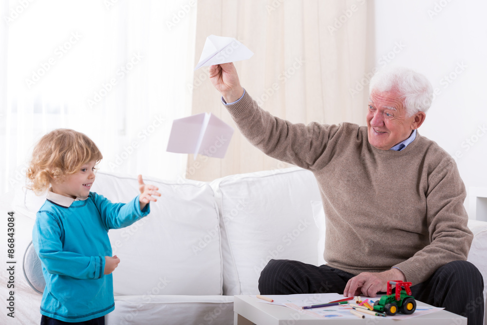 Kid and paper airplane Kid and paper airplane