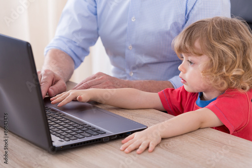 Child and laptop